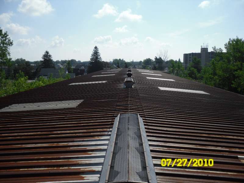 Rusted Metal Commercial Roof | Roof Coating Contractor