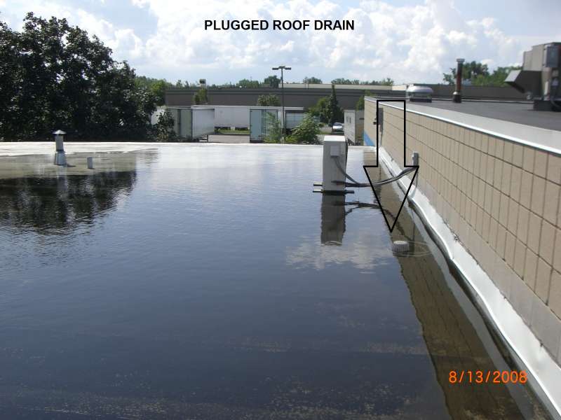Water Plugged Drain on Commercial Roof | Inspections and Maintenance